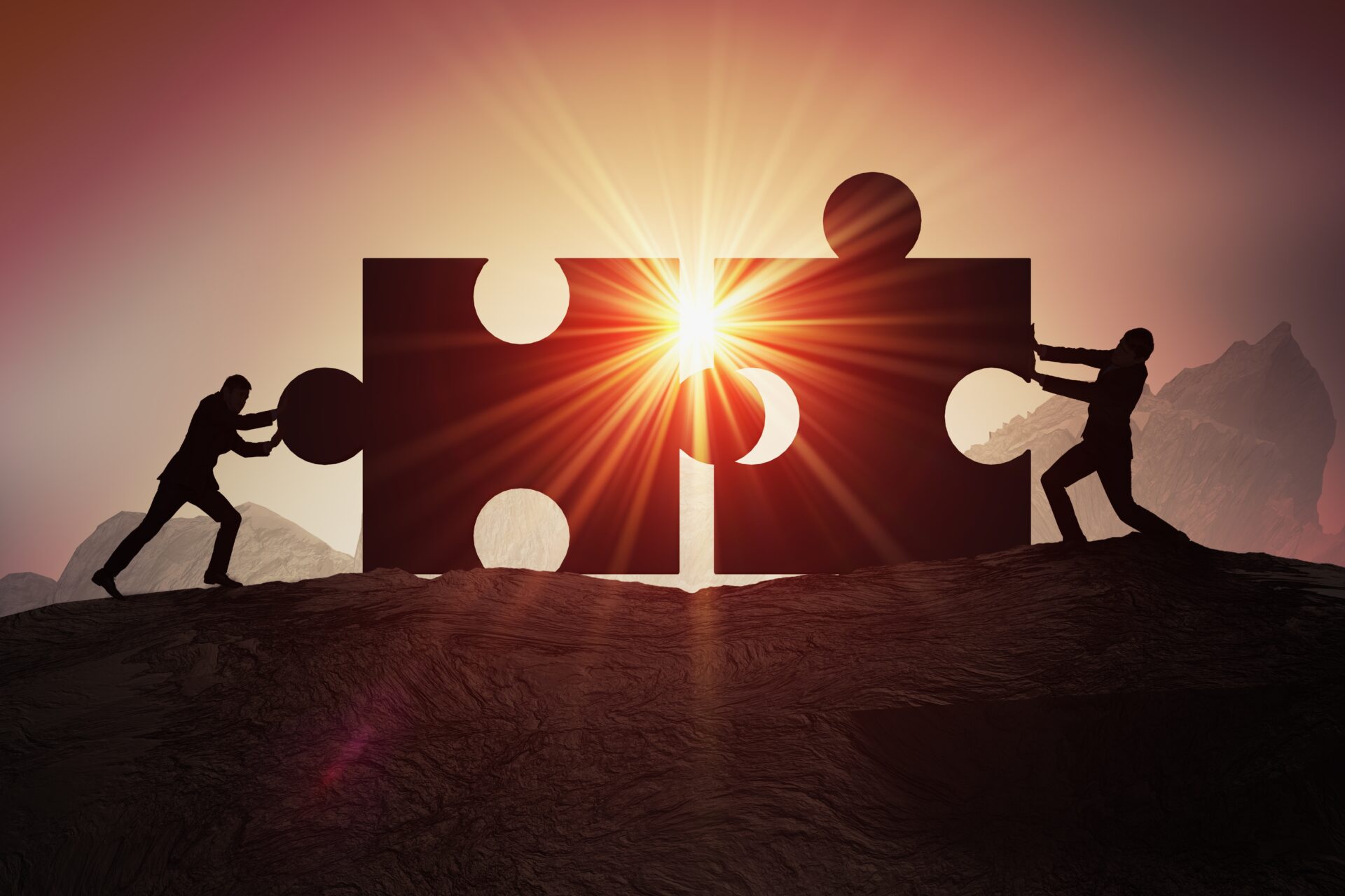 Teamwork, partnership and cooperation concept. Silhouettes of tw